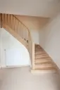 Escalier en bois avec volute de départ