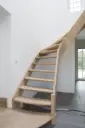 Escalier tournant à limon courbe